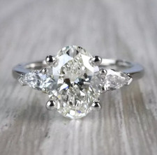 1.75CT Oval Cut Lab Created Diamond Three Stone Ring 14K White Gold Plated