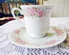 Regents Pink Flora Footed Tea Cup & Saucer Set on white background
