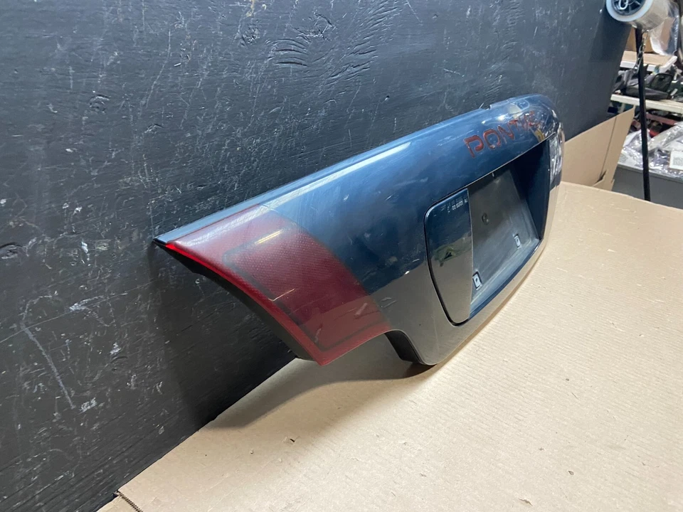 Центральный задний фонарь 1995–1999 Pontiac Sunfire E8526 DG1 - Изображение 3 из 4