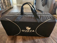 Guava Lotus Travel Crib and Portable Baby Playard Used only a few times 