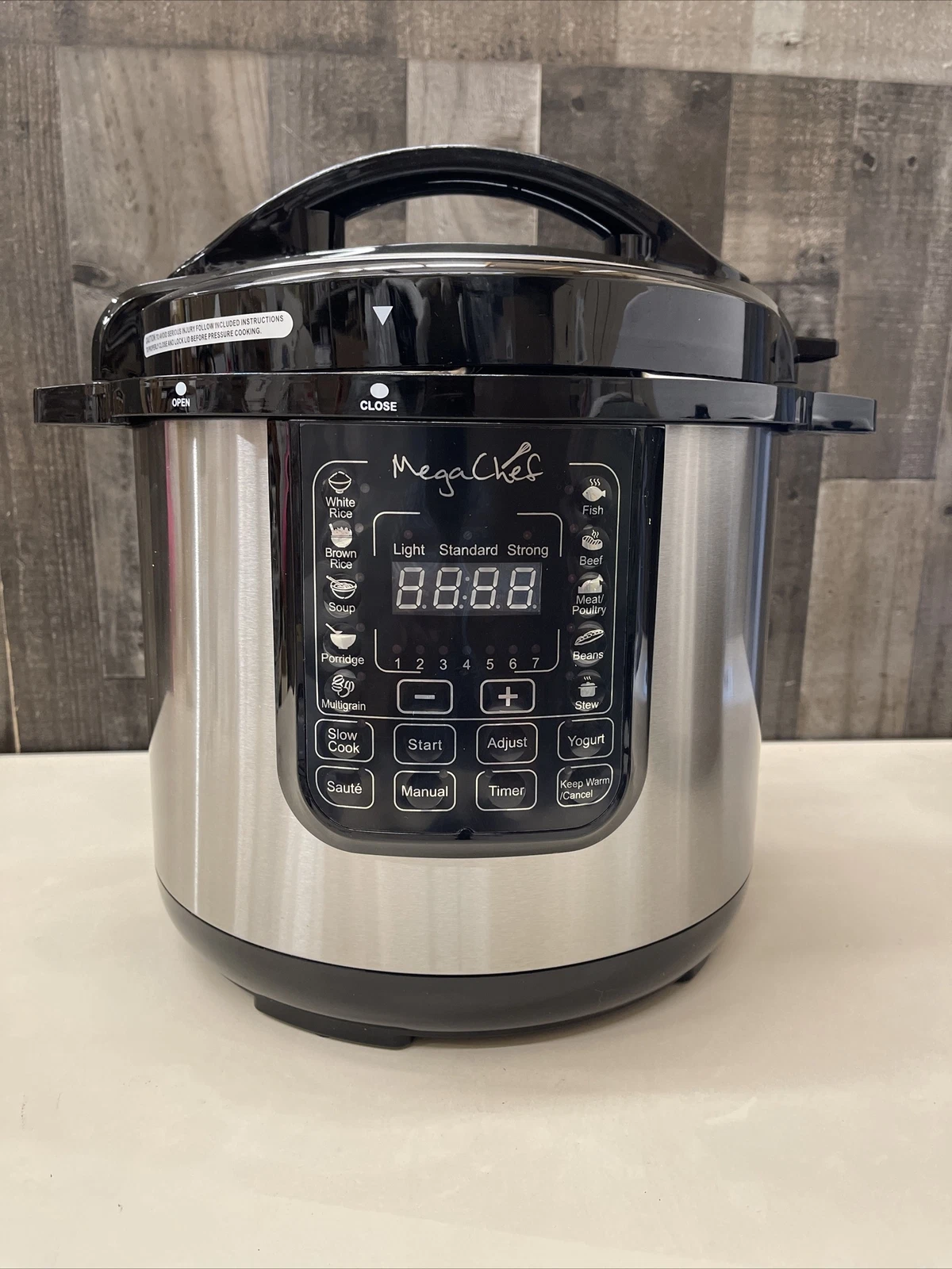 MegaChef 8-Quart Digital Pressure Cooker w/ 13 Pre-sets MCPR120