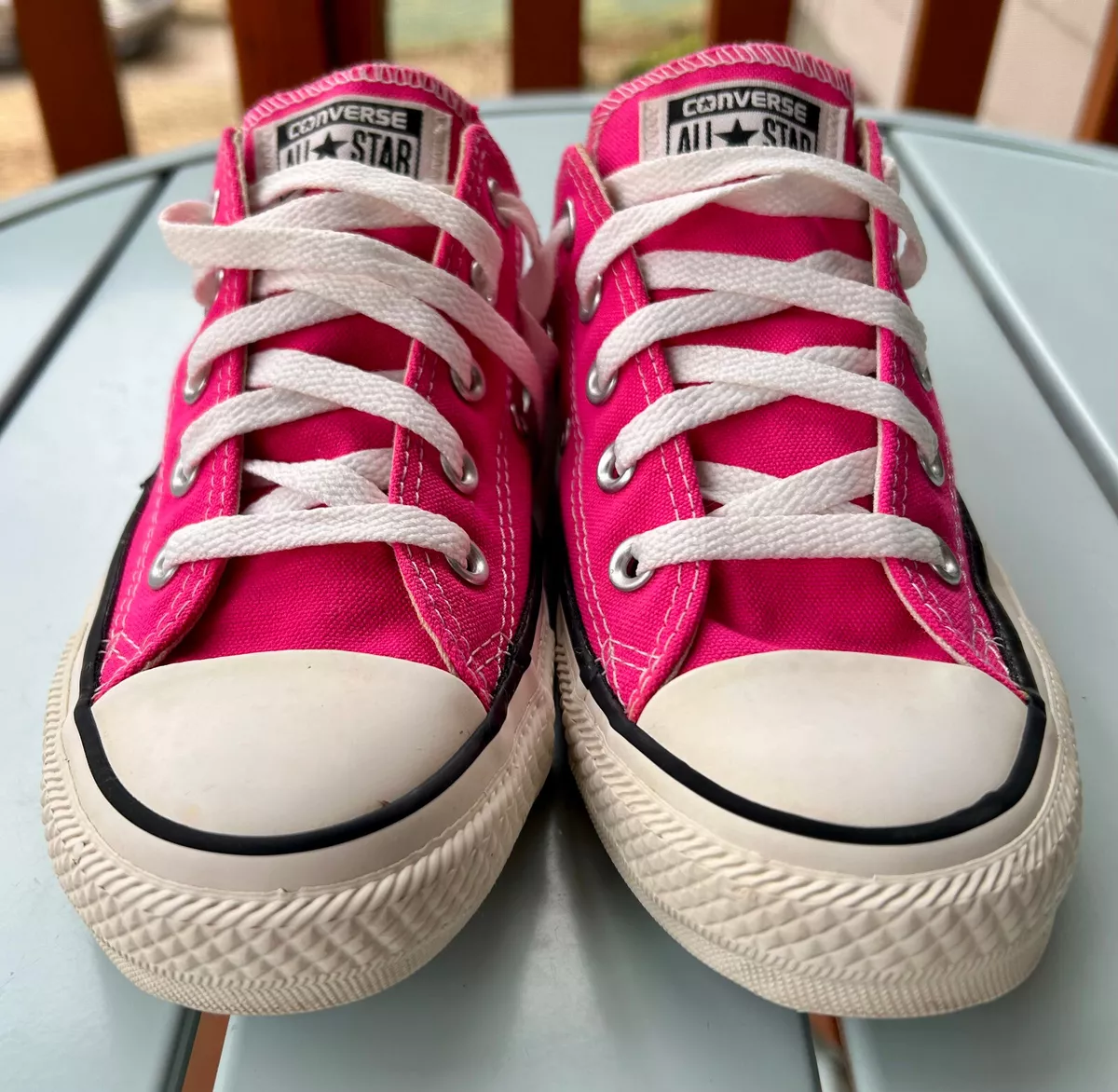 Dark hotsell pink converse