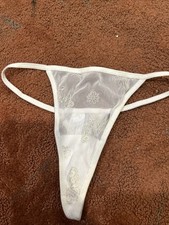 Women  s white lace thong. 8-10 Size