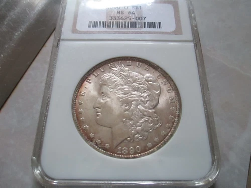 1890 O Morgan Silver Dollar NGC MS64 **BEAUTIFUL SATIN W/RIM TONING**