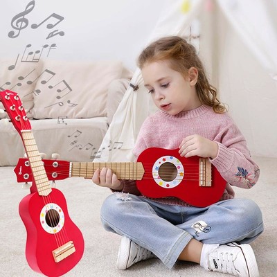 red toy guitar