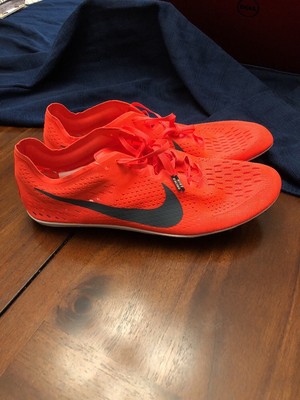 nike orange spikes