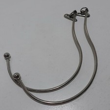 1 Pair of curtain tiebacks, chrome, screw into wall, swing 