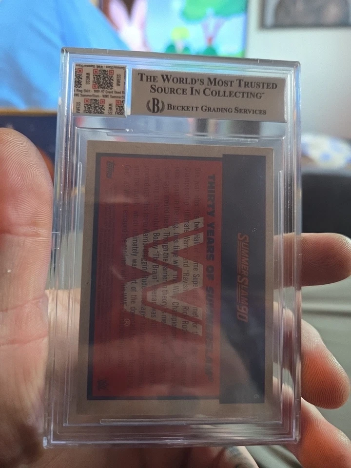 Rare 2017 Topps WWE Beckett 9 Summerslam  Ultimate Warrior 1992 Ring Skirt Used - Image 2 of 3