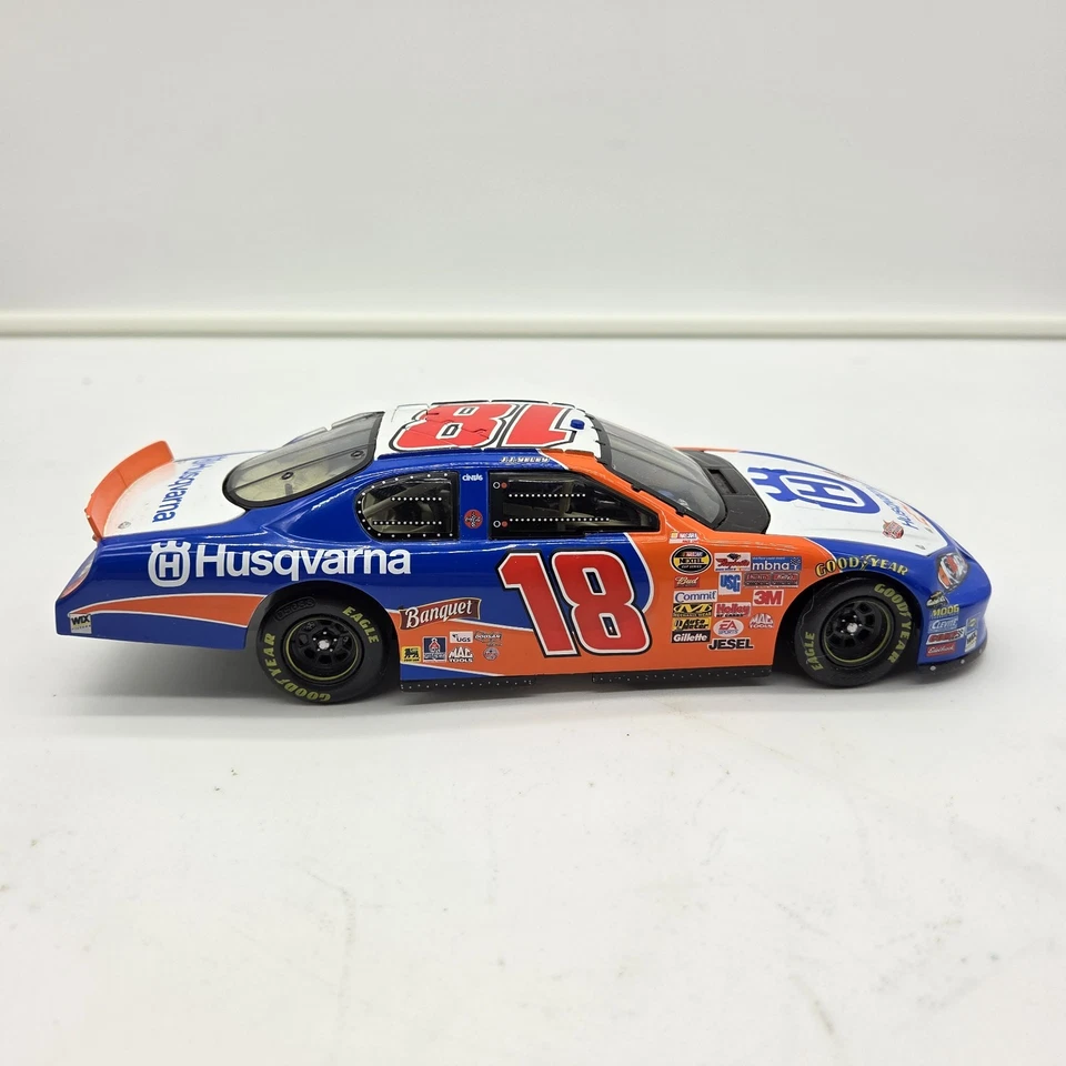 Motorsports Authentics #18 Husqvarna Chevy Monte Carlo SS – 1:24 NASCAR Diecast - Image 4 of 4