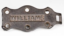 MINIATURE SAD IRON TRIVET MANUFACTURED BY A. C. WILLIAMS CO L 4-3/4" x 2-1/4"