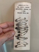 US military 12 CURVED SAFETY PINS on CARD NSN # FIRST AID WILLIAM PRYM CO