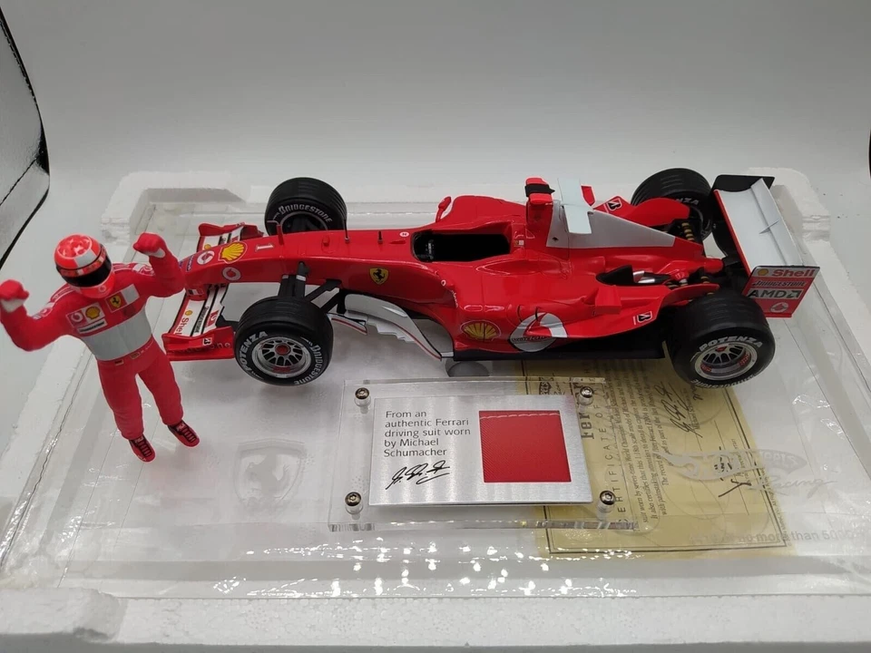 FERRARI F2004 M. SCHUMACHER 7 WORLD CHAMPION - HOTWHEELS RACING 1/18 - Immagine 3 di 4