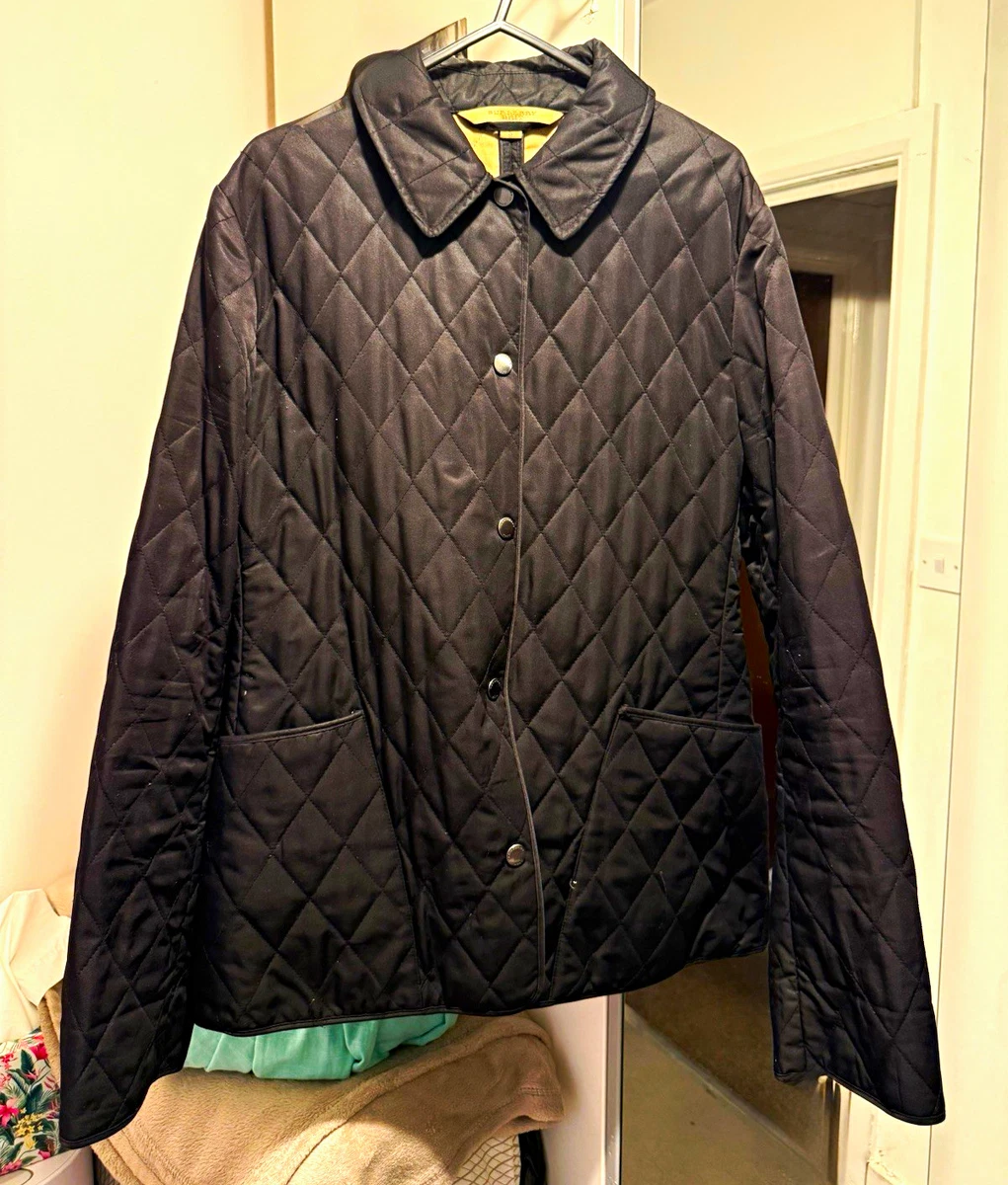Chaqueta a presión acolchada negra para mujer Burberry Brit con forro a cuadros UK 6 2M