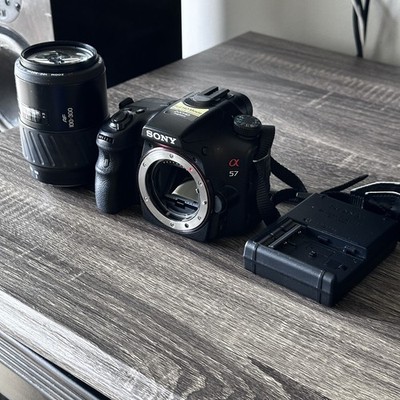 Sony Alpha SLT-A57 16.1MP DSLR Camera w/ battery charger and lense
