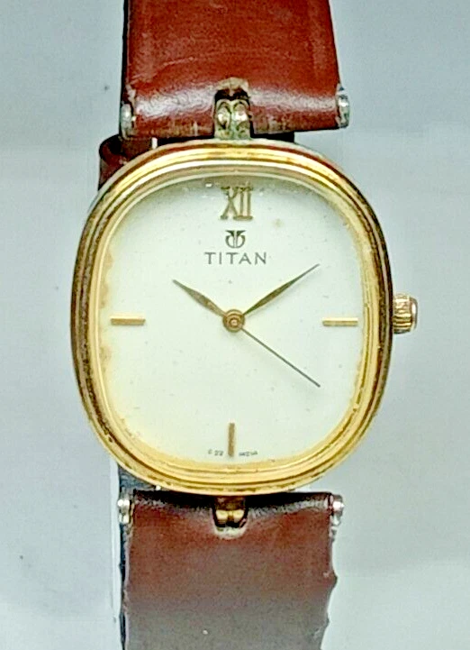 Titan wrist top watch with price