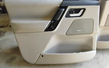 2007-2009 LAND ROVER FRONT DOOR PANELS OEM PART SOLD AS A PAIR WITH WINDOW SWITC