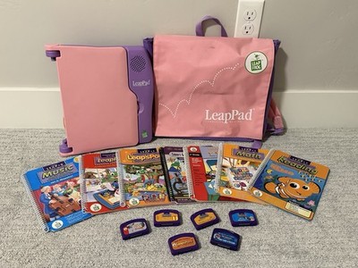 Leap Frog LeapPad Learning System Model 57 w/7 Books, 6 Cartridges, Bag - Pink