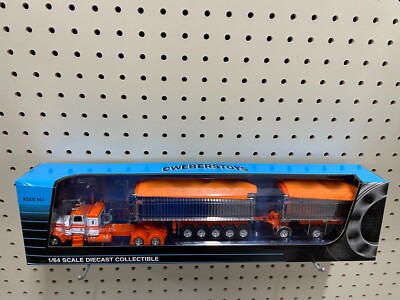 60-1566: Wht/Org/Chm Peterbilt sleeper with Chrome East  Genesis II Mfg.