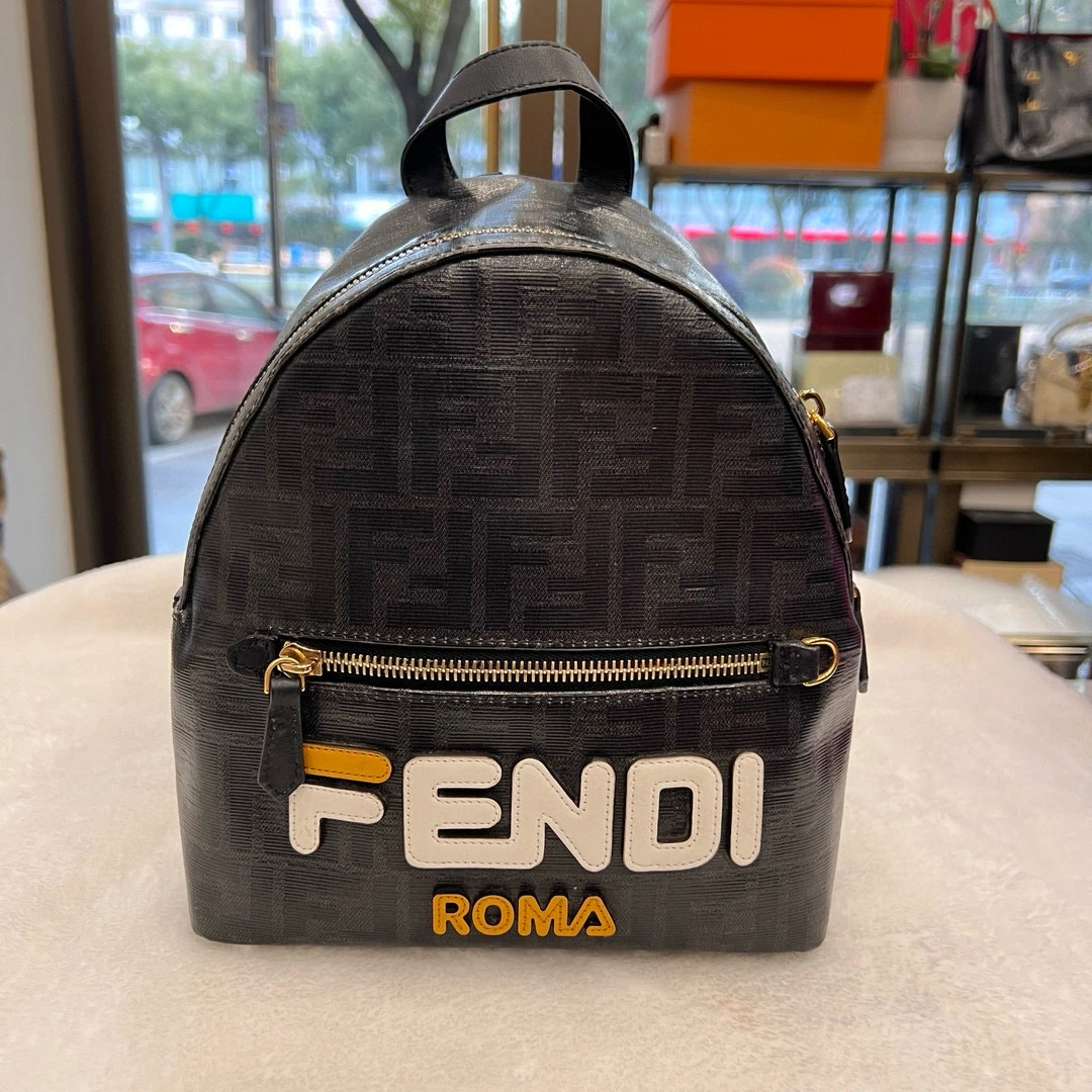 fendi back to school mini backpack blue Backpack Light Calfskin Leather BrandCo Paris tone metal hardware and chain strap Step into winter style with