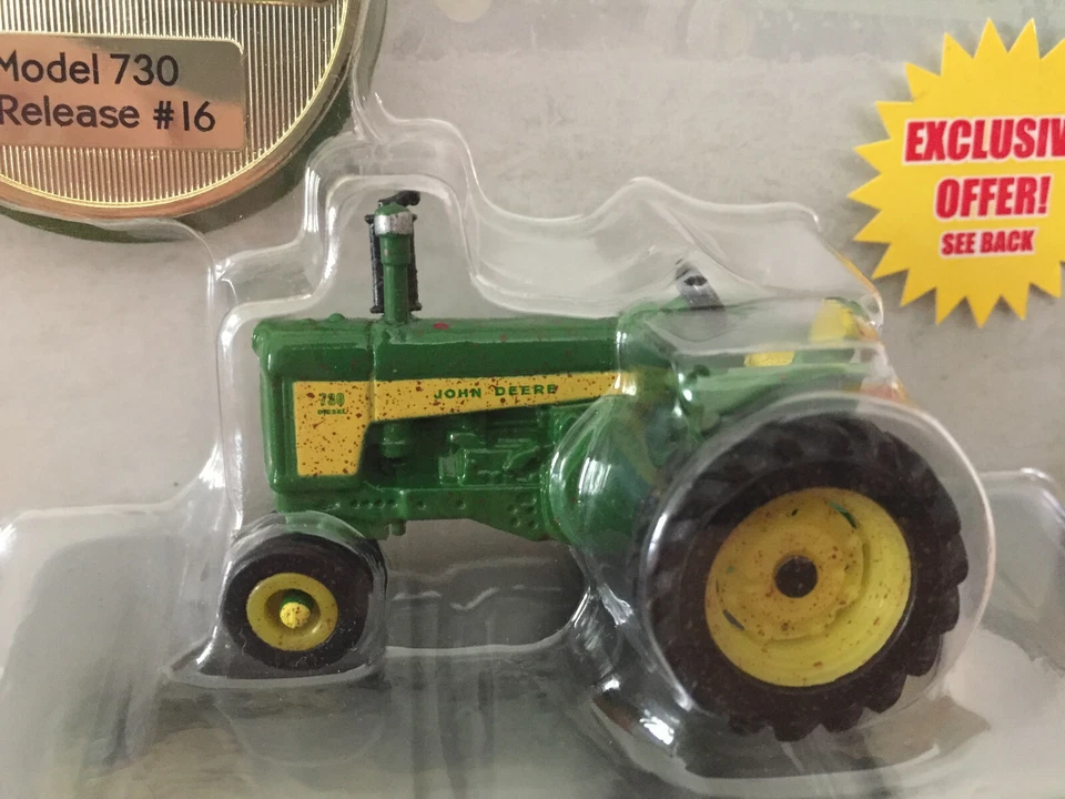 Tractor John Deere 730 Premier ultra raro versión fangosa escala 1/64 nuevo en paquete por Ertl Foto 2 de 4