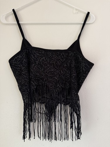 Black Y2K tank crop top with silver fringe, beaded sections, and spaghetti straps on white hanger.