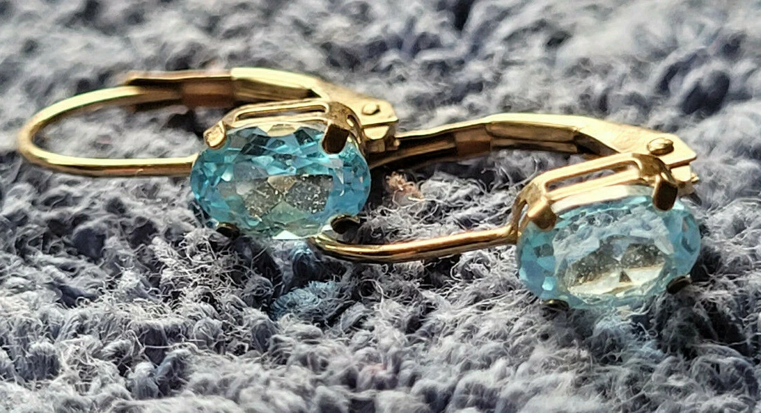 10k Yellow Gold Pierced Earrings Light Blue Stone