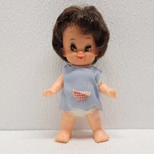 Vintage Plastic Small Girl Doll Funny Face Dark Brown Hair Eyelashes Green Eyes