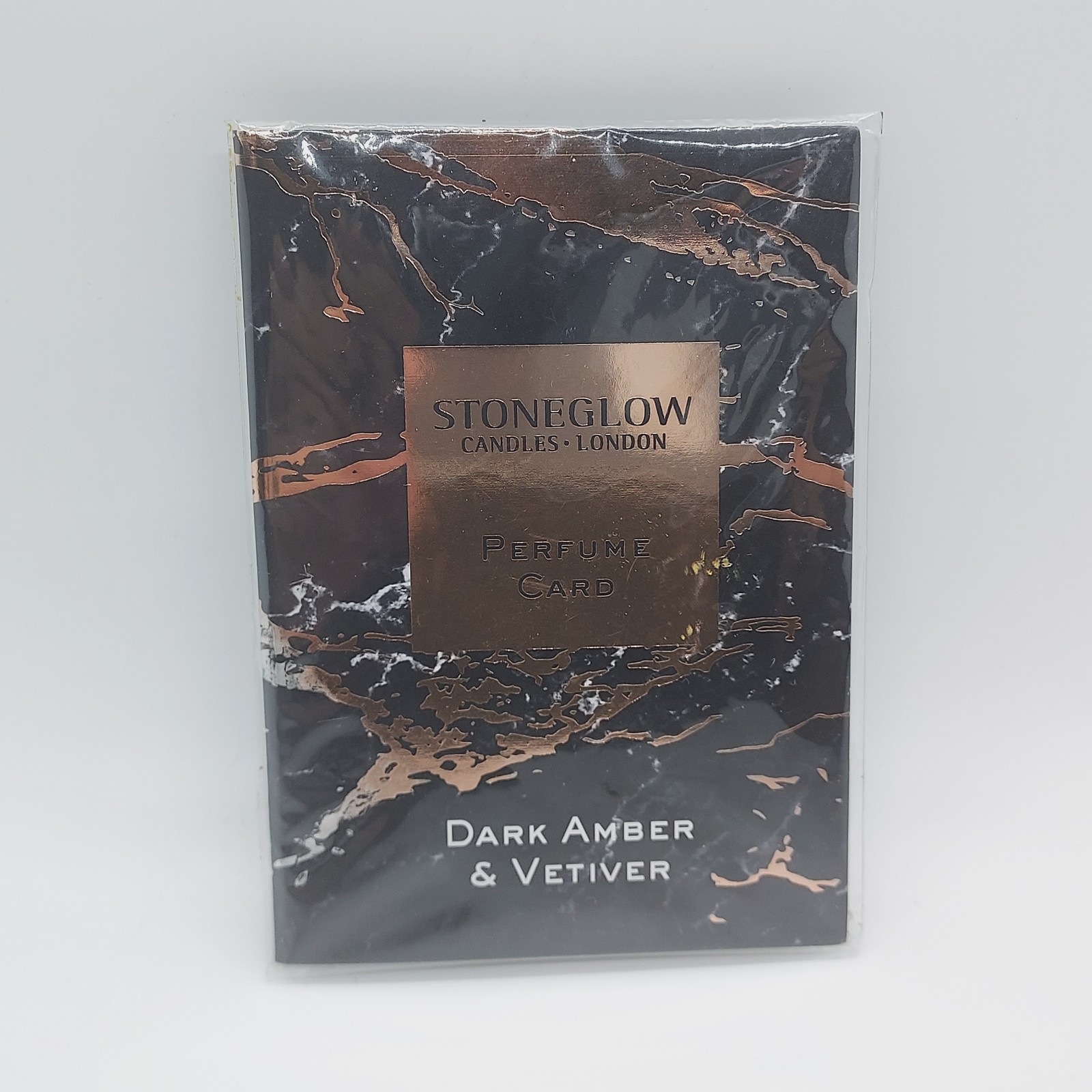 StoneGlow Candles perfume card - Dark amber & Vetiver