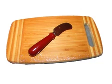 KNIFE and CUTTING BOARD 11.5 x 6.5 x .75" shrink wrapped, cheese snacks (hall B)