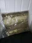 Decorative Throw Pillow Featuring a Green and Gold Color Scheme — photo 1