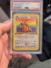 DRAGONITE 1999 POKEMEN FOSSIL 1ST ED. RARE NON HOLO #19 PSA  7 NEAR MINT (072)