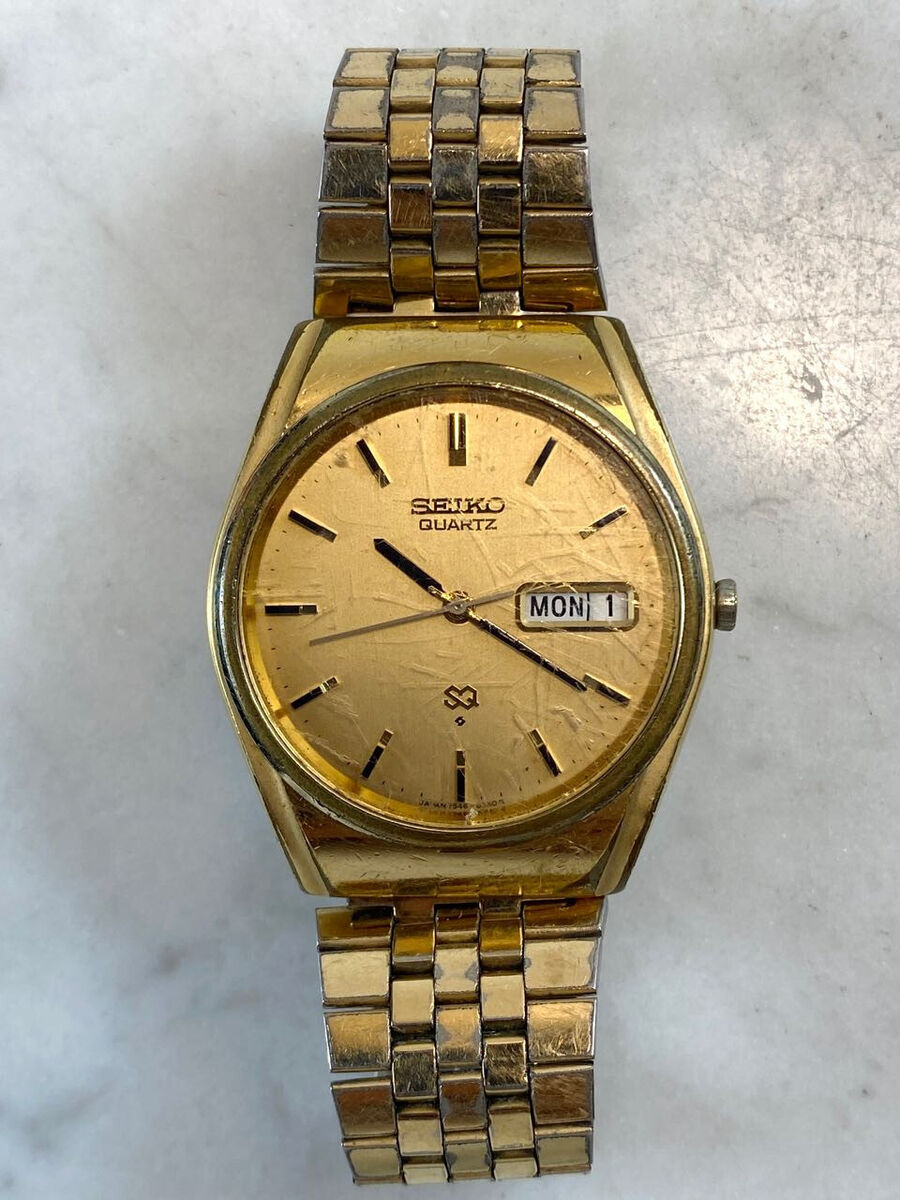 Vintage SEIKO SQ Gold Tone Oyster Watch. Day Date 4 Jewels Vintage SEIKO SQ Gold Tone Oyster Watch. Day Date 4 Jewels