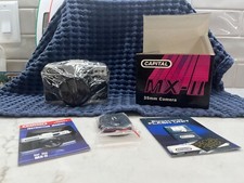 CAPITAL MX-II 35MM FILM CAMERA W 50MM LENS, CASE, AND ORIGINAL PACKAGING