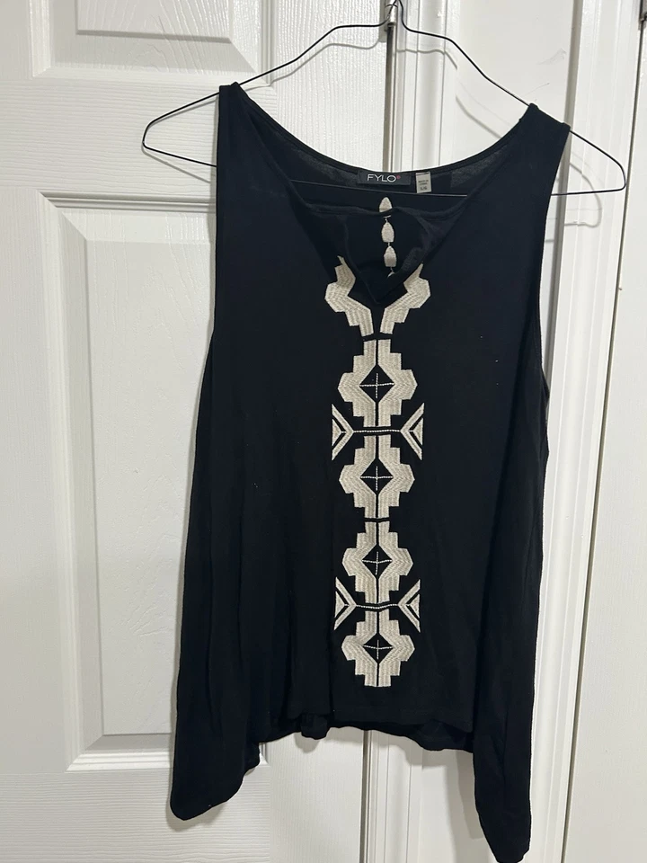 Lote de 8 piezas tops XL y L y una falda en excelente estado Foto 3 de 4