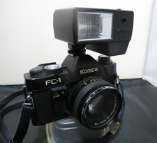 KONICA FC-1 35mm Film SLR Camera w/Hexanon 50mm Lens + Flash & Manuals