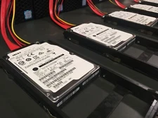 LOT OF 5* HGST 1.2TB 10K 2.5" SAS HUC101212CSS600 DKR5E-J1R2SS W/TRAYS *520BLOCK