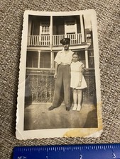 WWII Photo US Army Soldier And Young Girl Pose In Front Of Apartment Home Leave