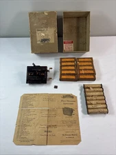 Vintage 1928 Rolmonica With 16 Rolmonica Music Rolls.