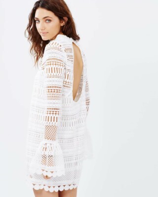 white christmas dresses Desert Rose Dress White Crochet Lace Up Front Boho Mini Long Sleeve Ma –  Made4Walkin main image 0