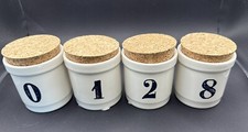 4 SMALL CROCKS With Cork Lid numbered 0, 1, 2...