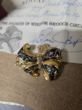 EDGAR BEREBI DUCHESS OF WINDSOR BLUE AND CRYSTAL BROOCH