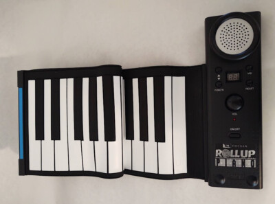 HECSAN Portable Electronic Roll-Up Piano with 49 Keys
