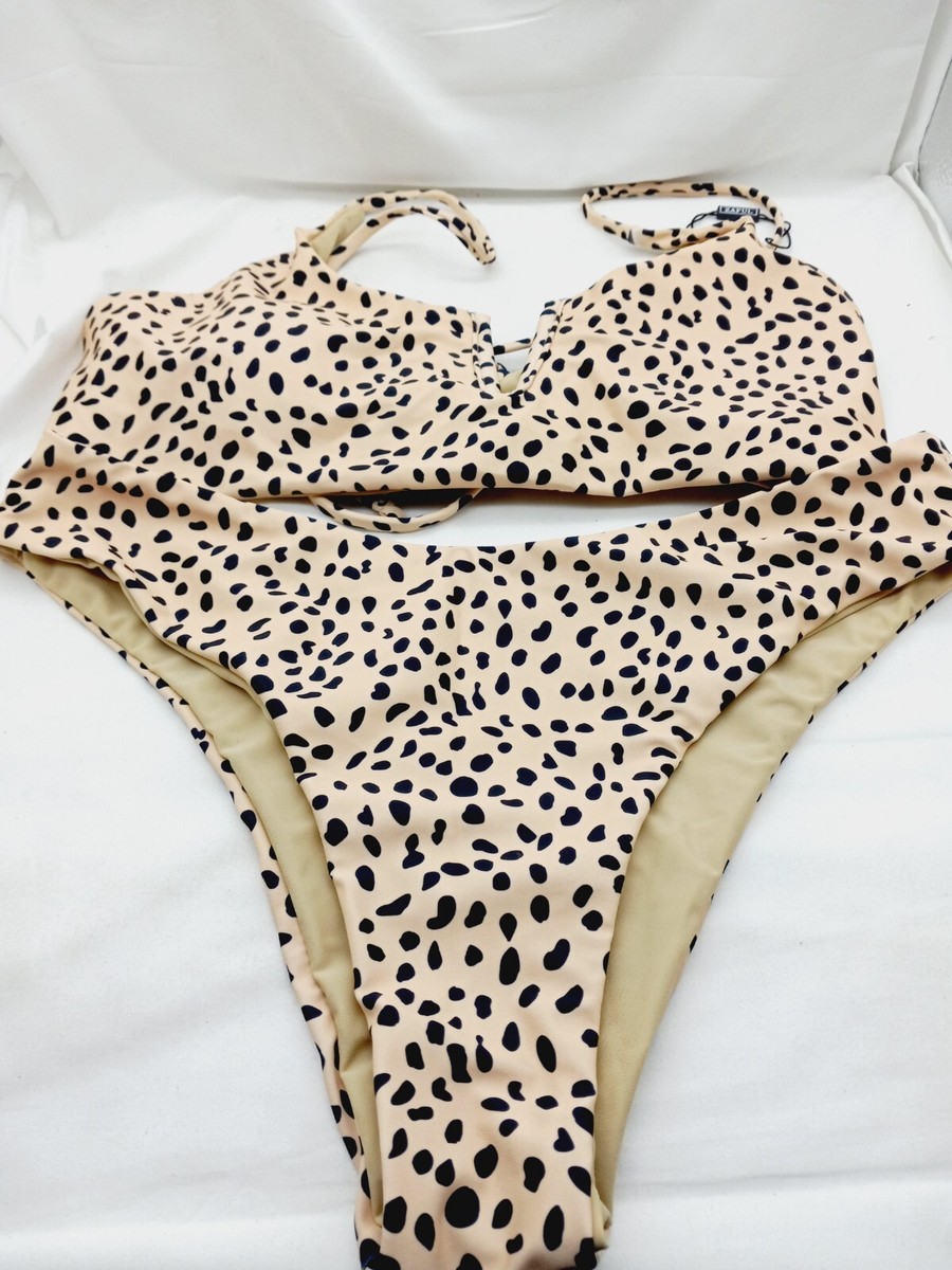A high-cut thong bikini bottom with leopard print.