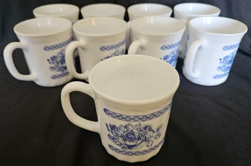 9 Vintage Arcopal Honorine Milk Glass Mugs w/Blue Rose 3 1/2" High. France.