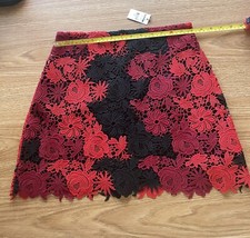 Express women's red/black/burgundy lace short skirt , back zip and size 4