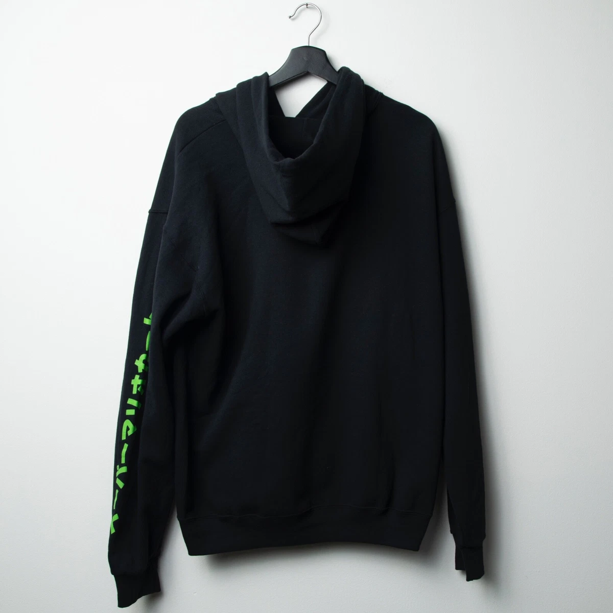 Black hoodie with neon green writing sales