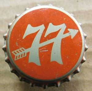 '77' [pointing 'feet'] UNUSED WITH CORK beer bottle cap Globe, Baltimore MD