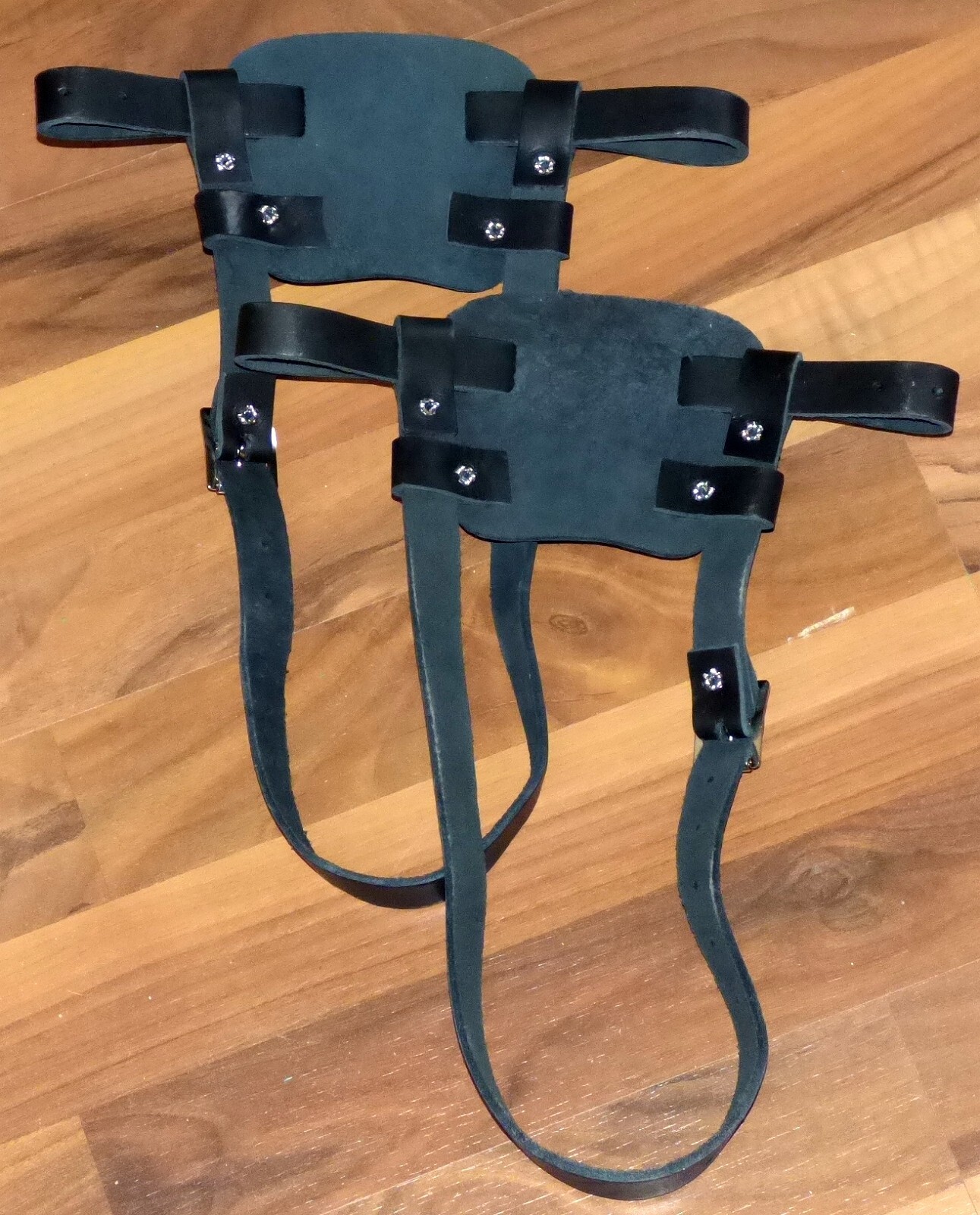 Brand new pair of black colored leather bindings for snowshoes