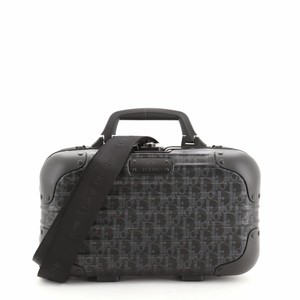 dior and rimowa hand case