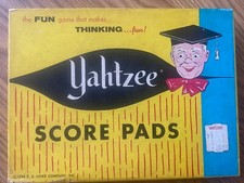 PARTIAL BOX OF VINTAGE 1956 YAHTZEE SCORE PAD...